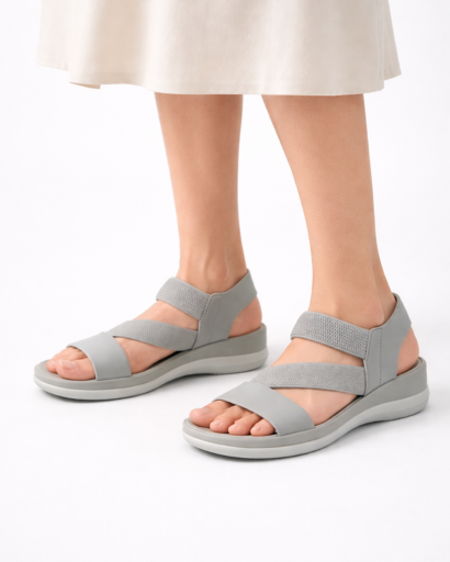 Women’s wedge sandals with criss-cross straps, back strap, and thick sole