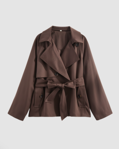 Short belted trench coat with double-breasted buttons and wide lapels