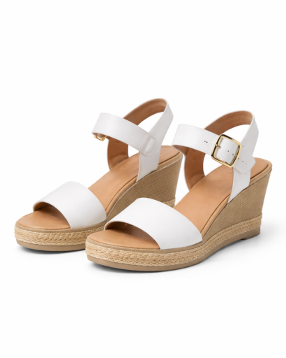 Women’s wedge sandals with ankle strap and buckle, featuring a textured espadrille-style platform sole