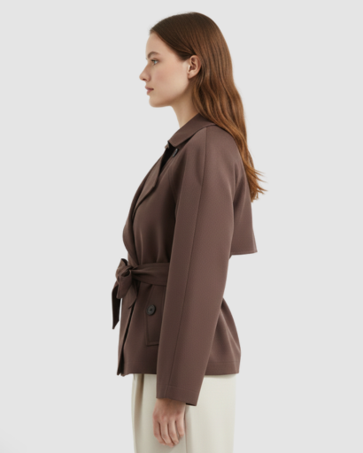 Short belted trench coat with double-breasted buttons and wide lapels